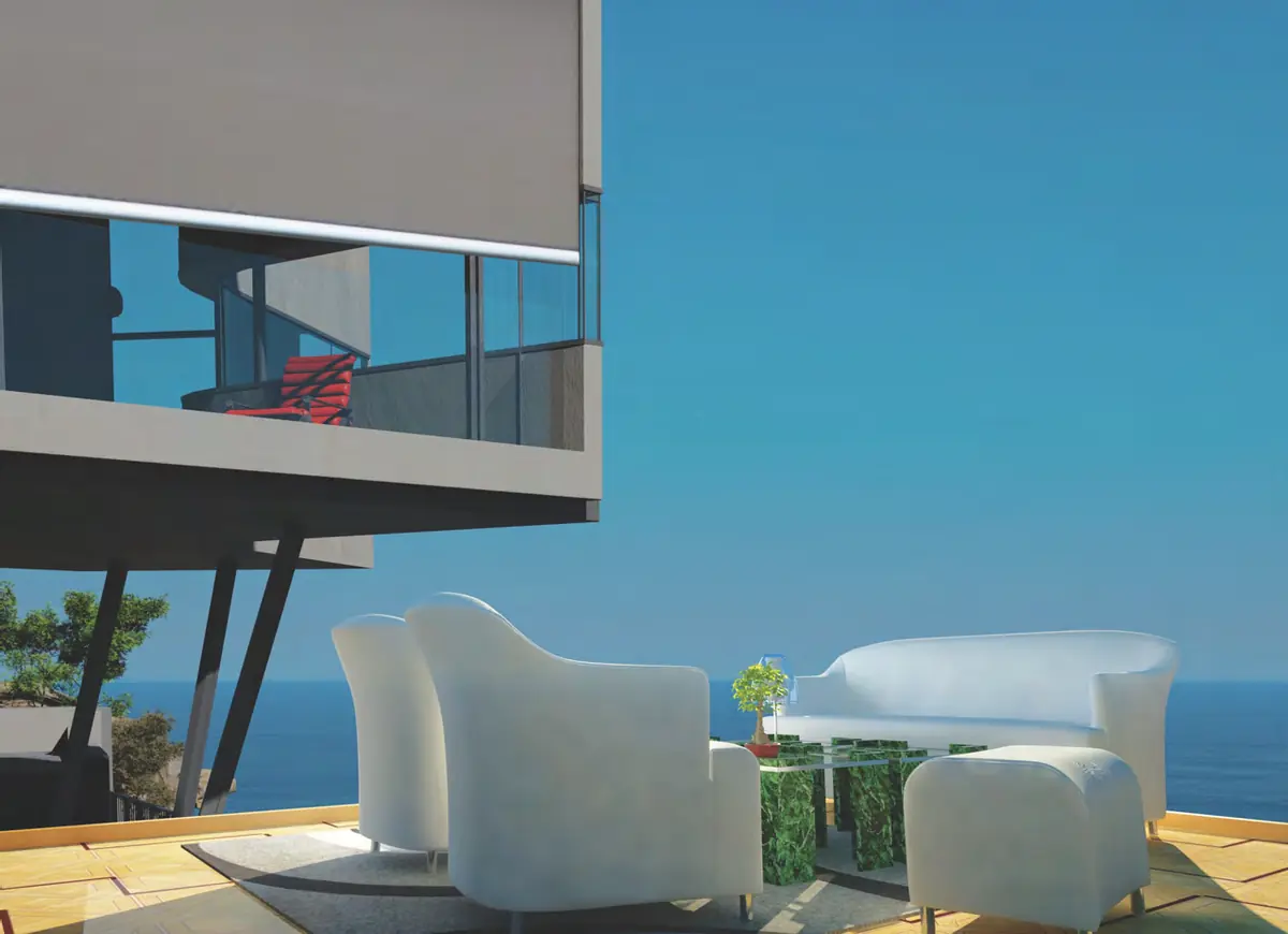 Exterior straight-drop blinds shading an ocean-front terrace