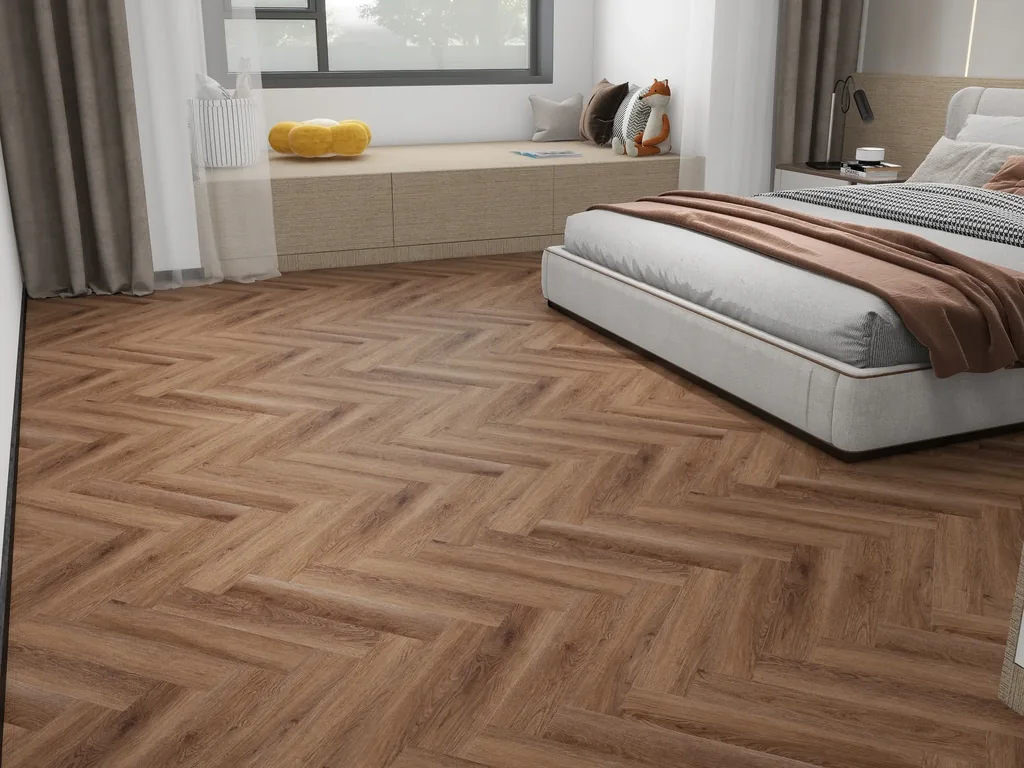 A herringbone parquet floor in a bedroom