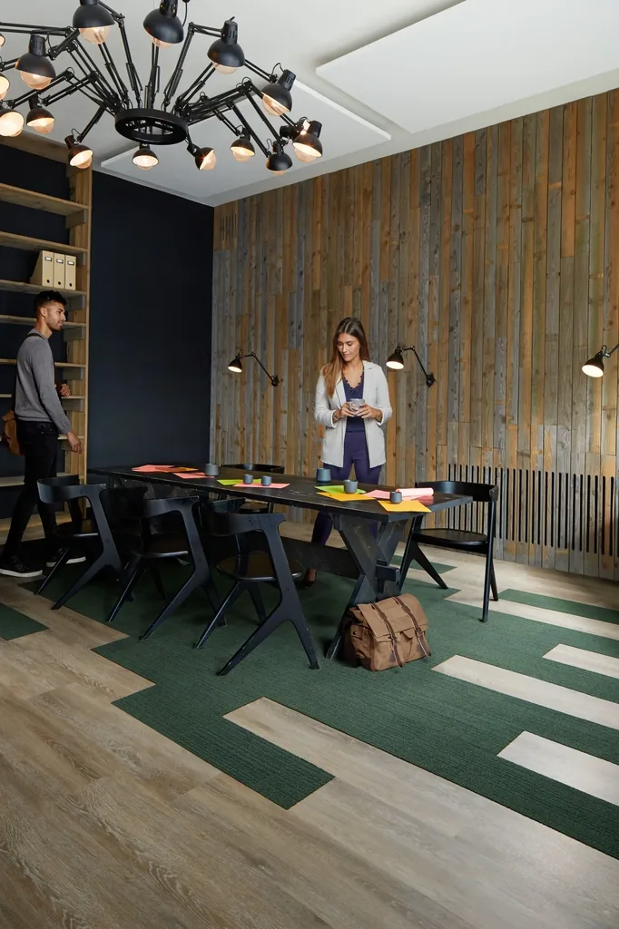 A commercial office fit-out on textured woodgrain flooring